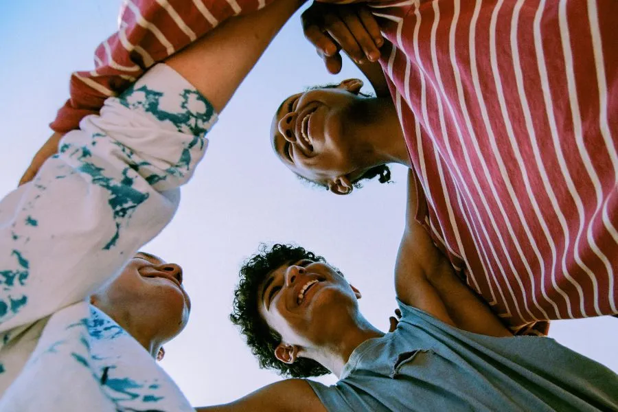 group of friends hugging